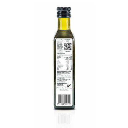 Back of bottle of Grove avocado oil with a label on a white background